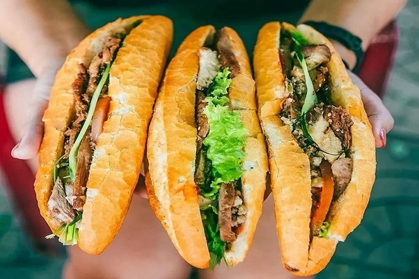 Banh Mi sandwiches filled with meat, herbs and vegetables in Hoi An